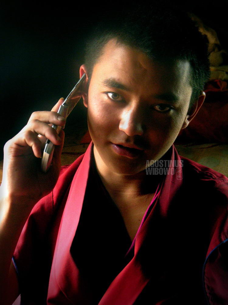A Monk with Mobile Phone
